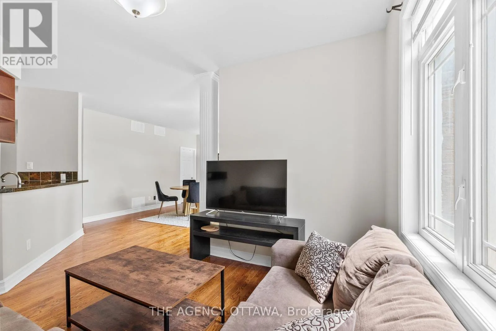 203 - 711 CHURCHILL AVENUE N