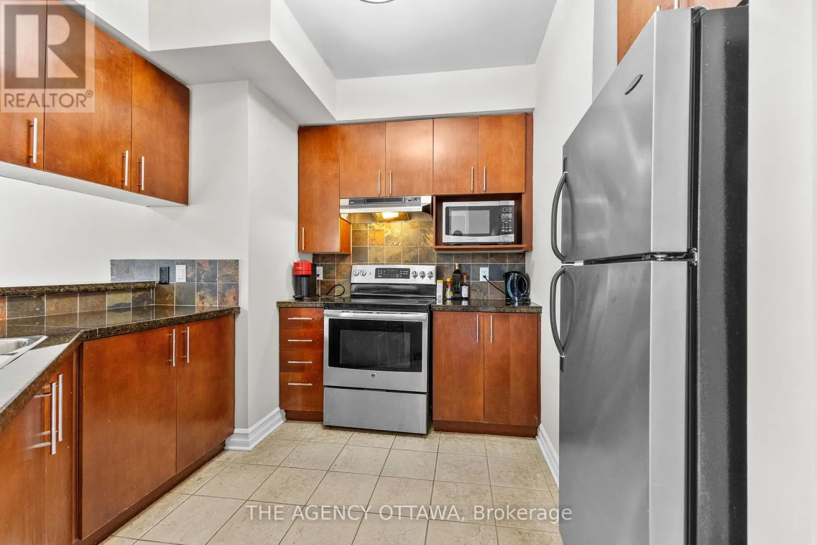 203 - 711 CHURCHILL AVENUE N