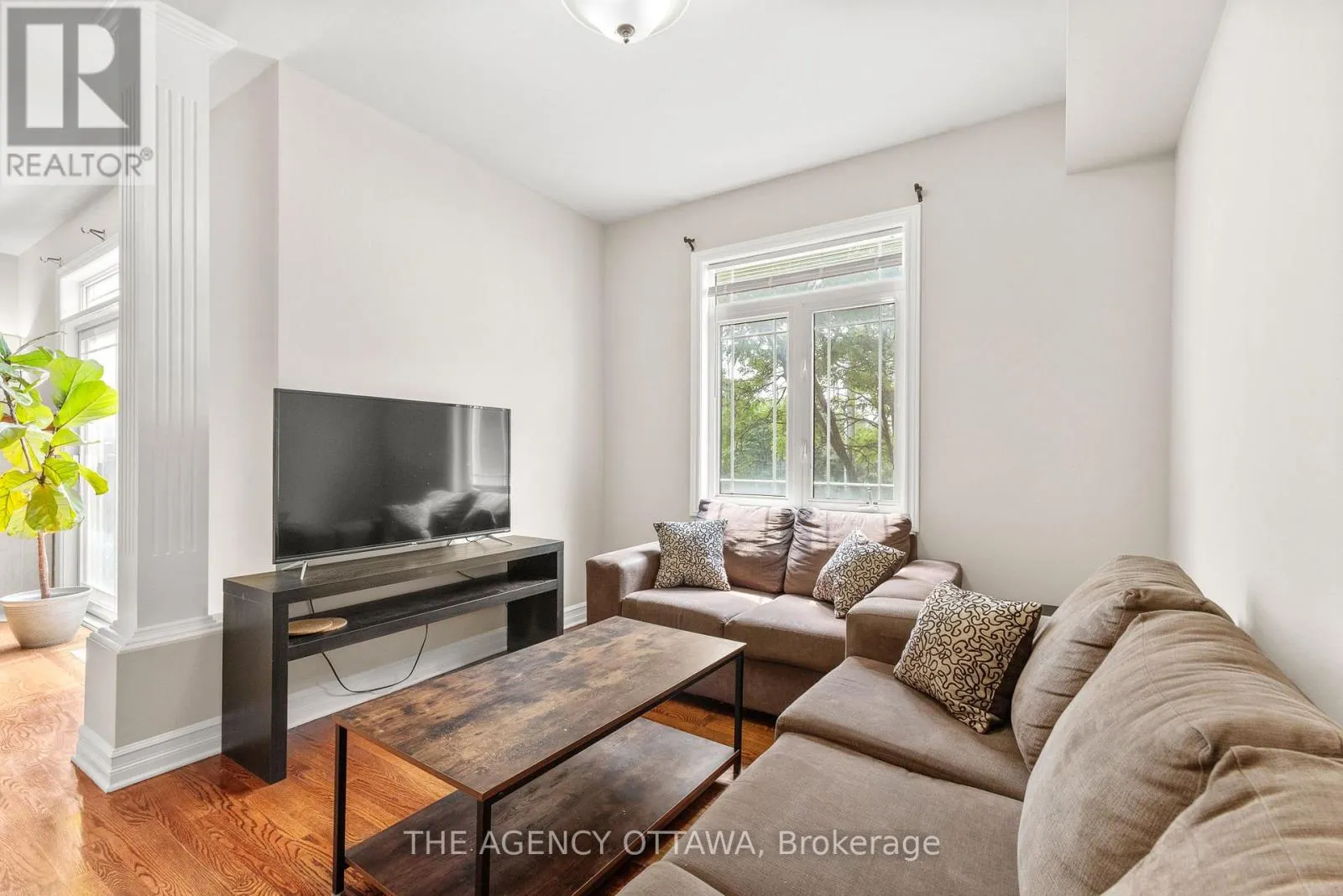 203 - 711 CHURCHILL AVENUE N