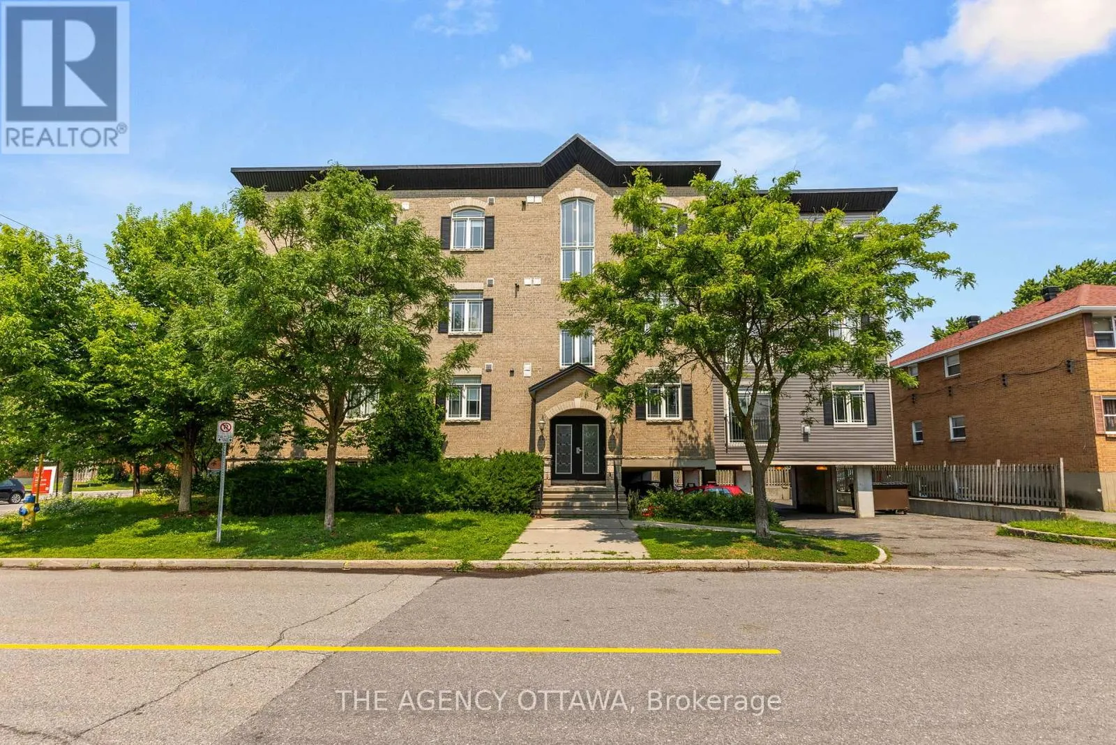 203 - 711 CHURCHILL AVENUE N