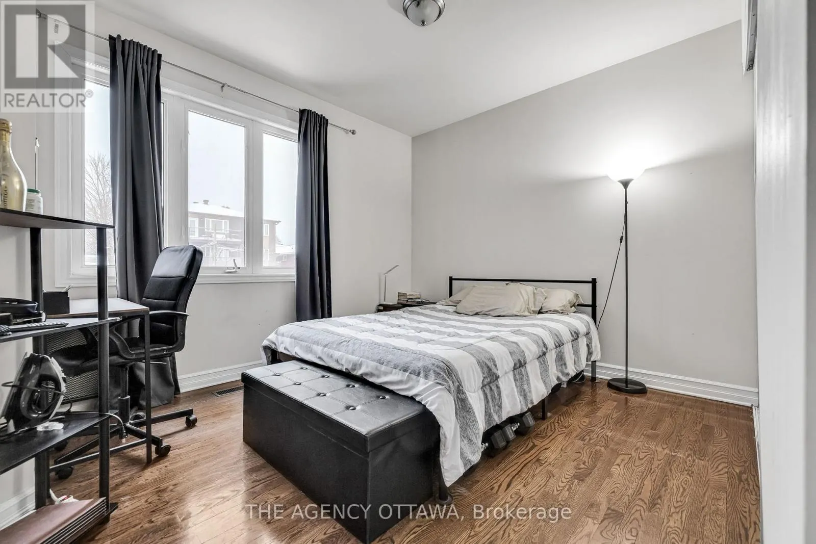 203 - 711 CHURCHILL AVENUE N