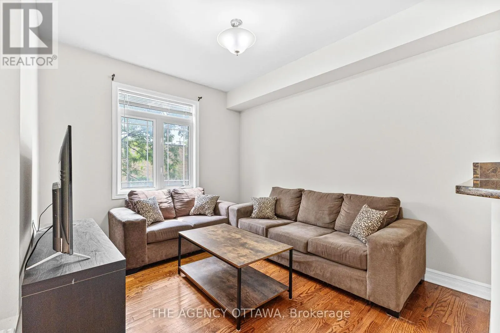 203 - 711 CHURCHILL AVENUE N