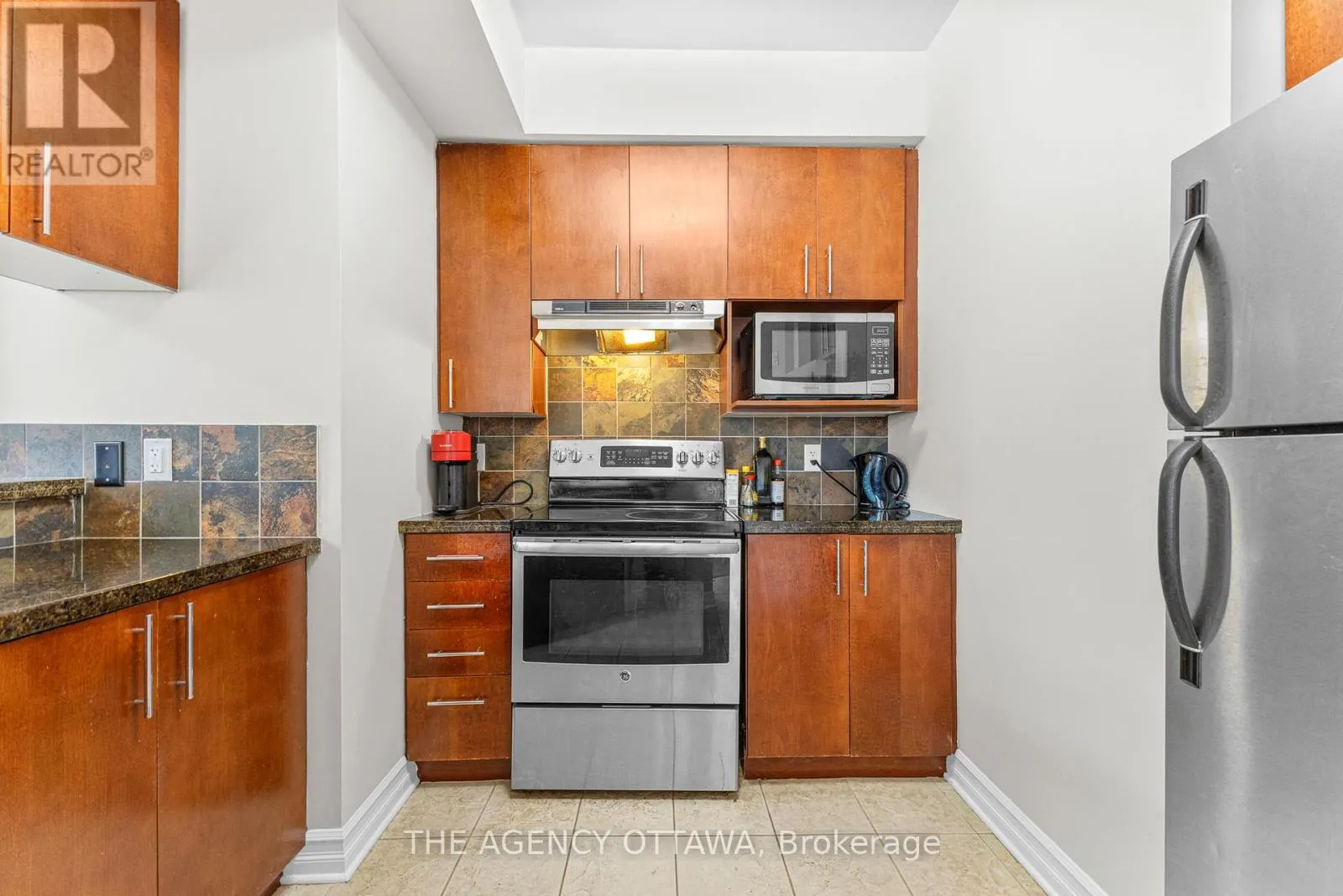 203 - 711 CHURCHILL AVENUE N