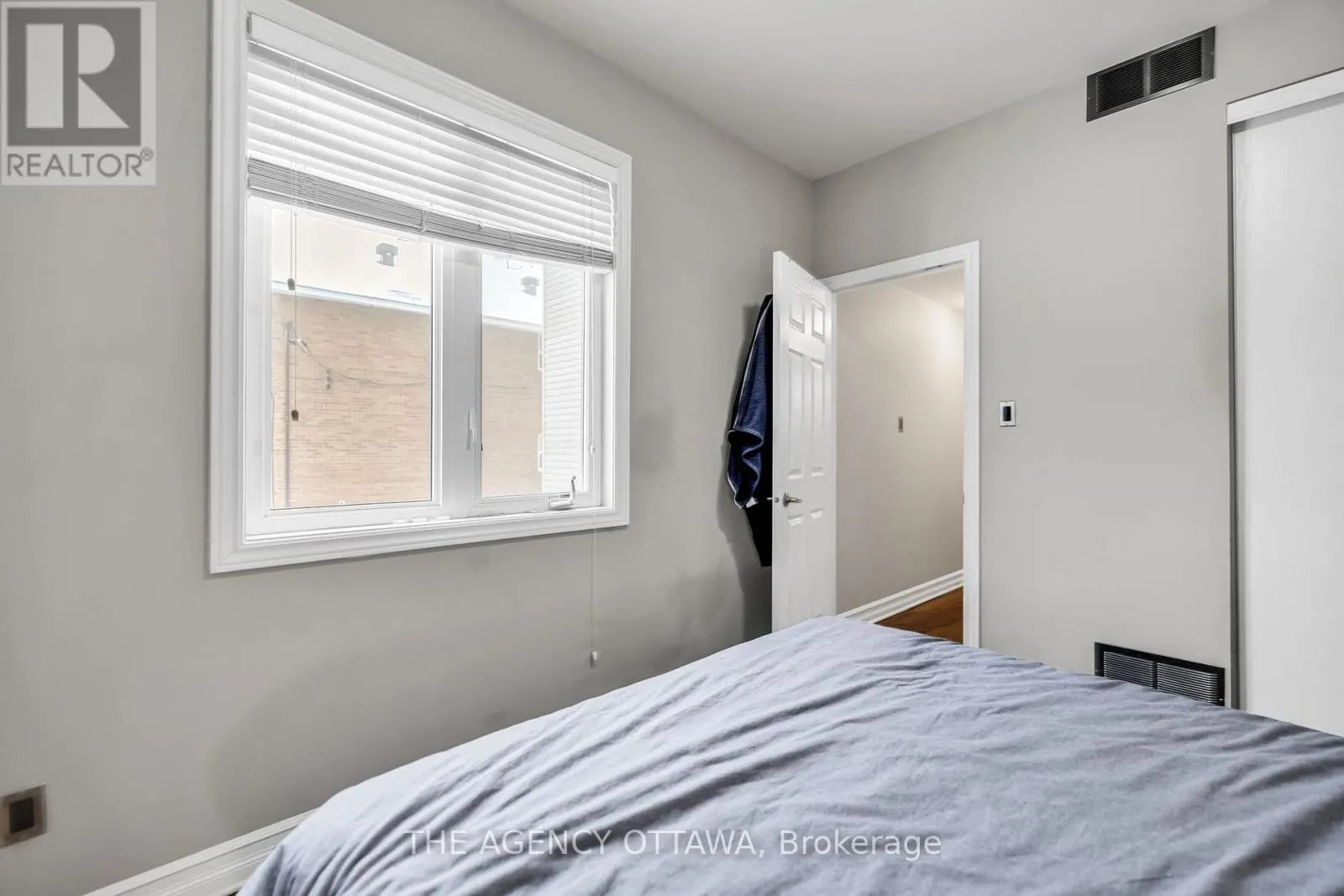 203 - 711 CHURCHILL AVENUE N