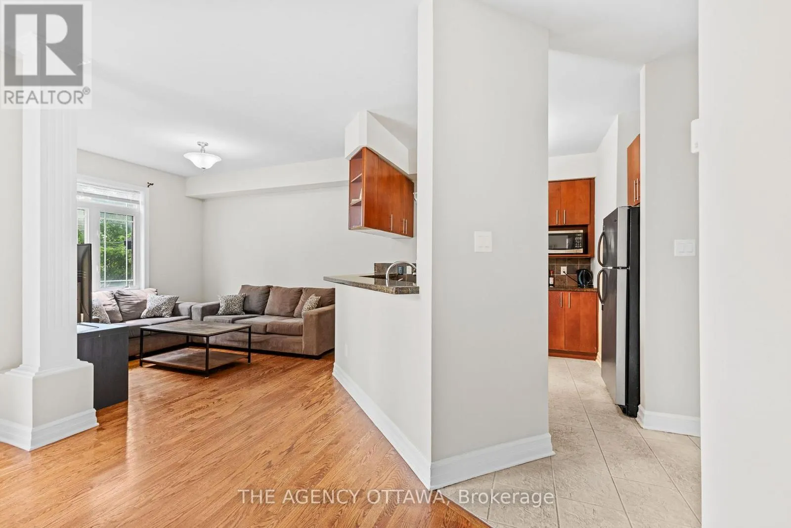 203 - 711 CHURCHILL AVENUE N
