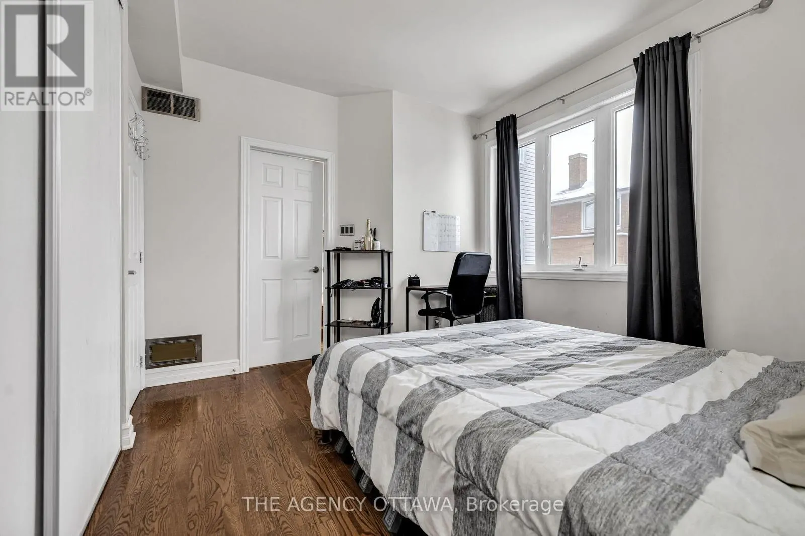 203 - 711 CHURCHILL AVENUE N