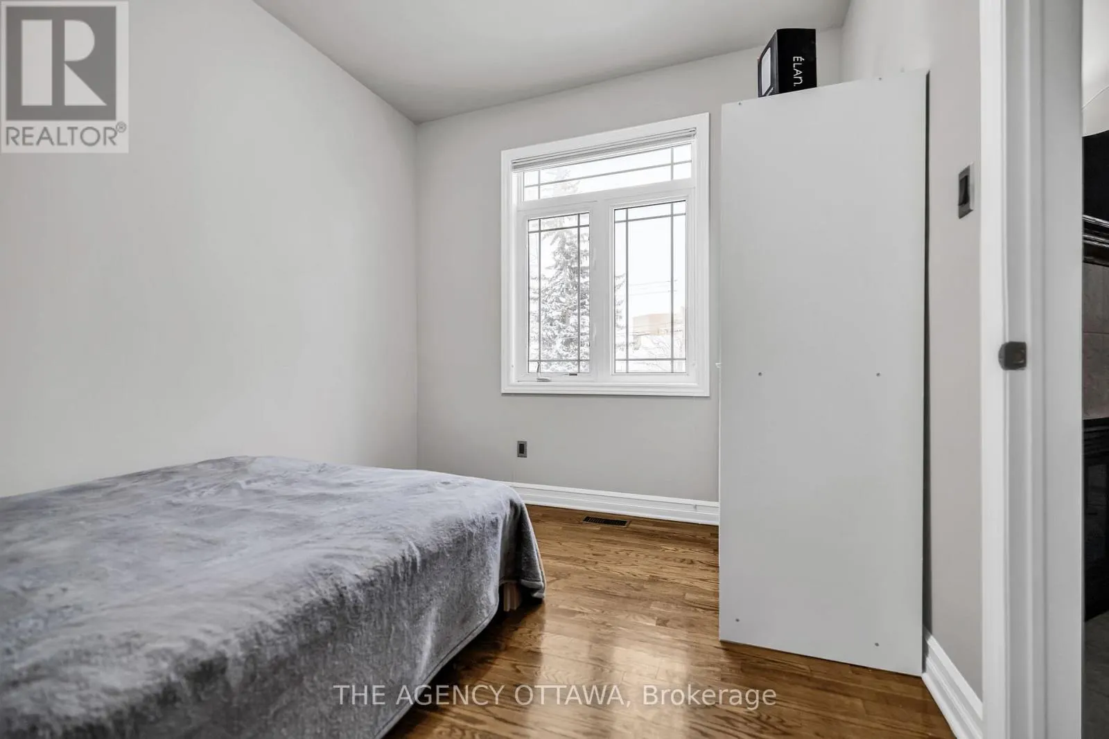 203 - 711 CHURCHILL AVENUE N