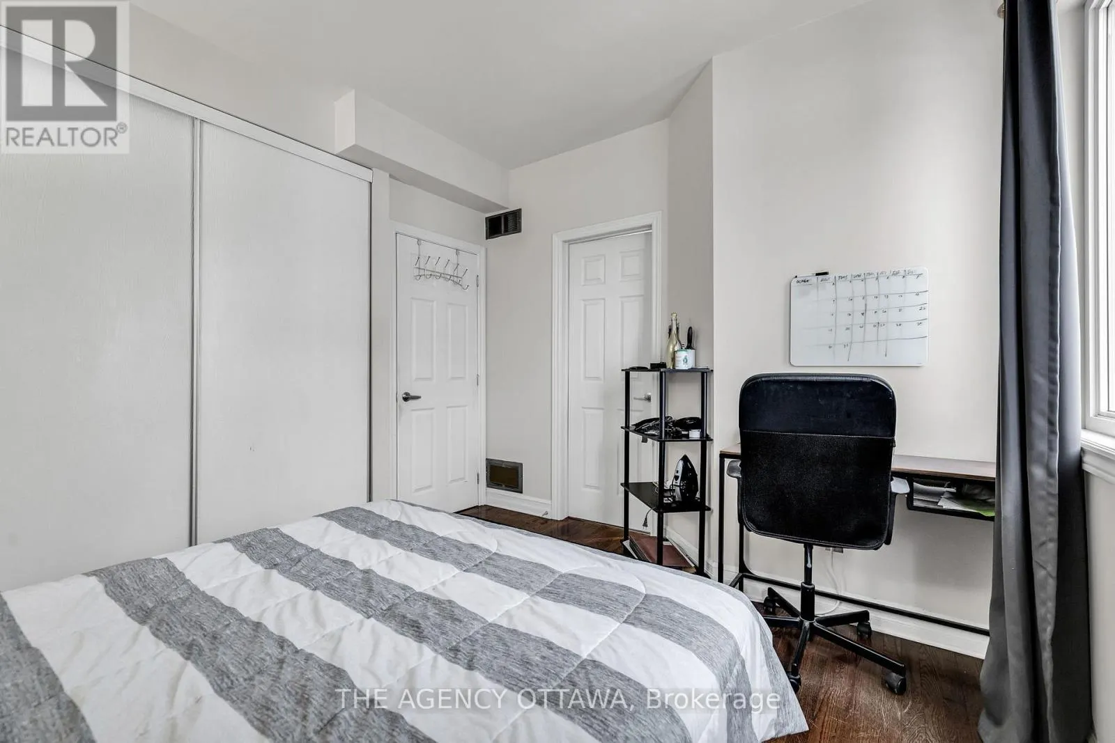203 - 711 CHURCHILL AVENUE N