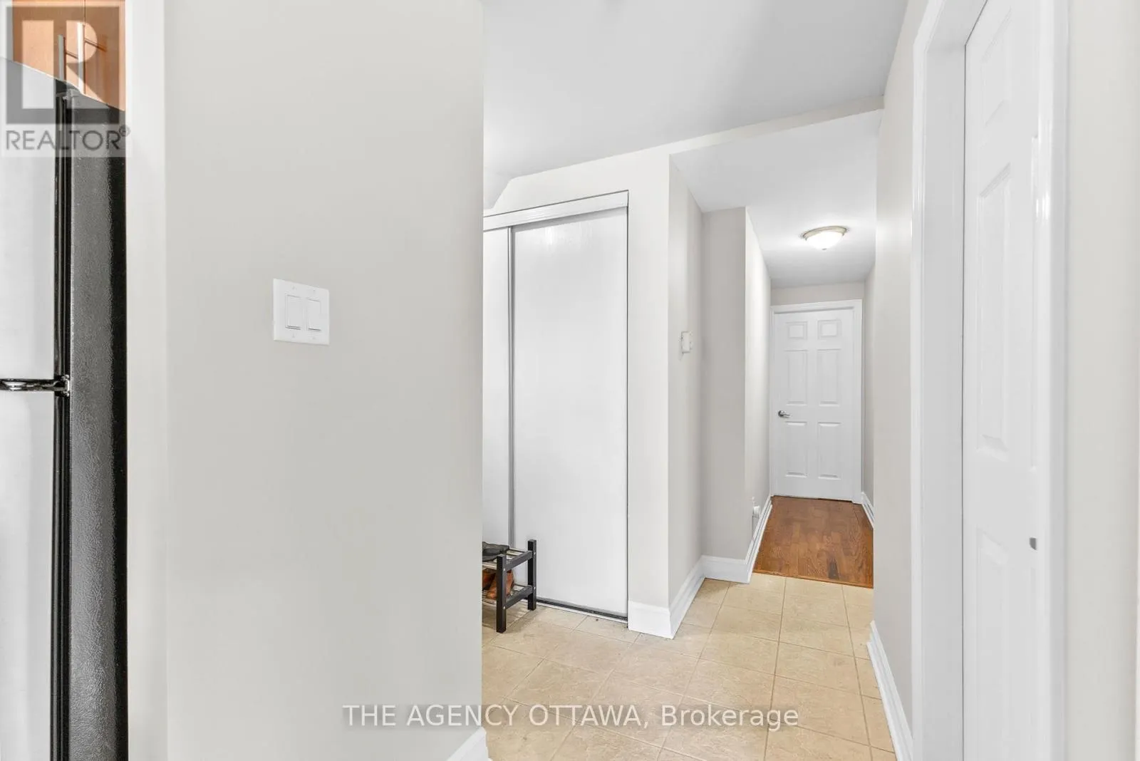 203 - 711 CHURCHILL AVENUE N