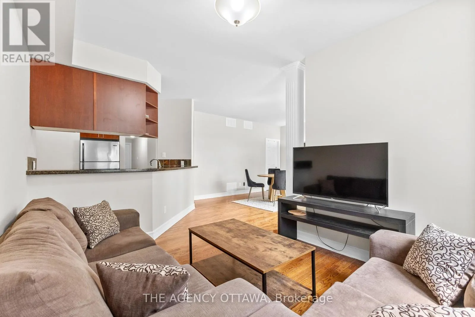 203 - 711 CHURCHILL AVENUE N