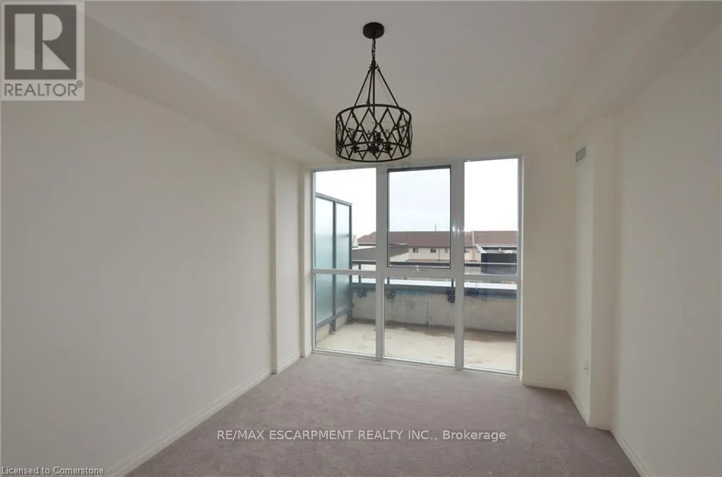 203 - 560 NORTH SERVICE ROAD
