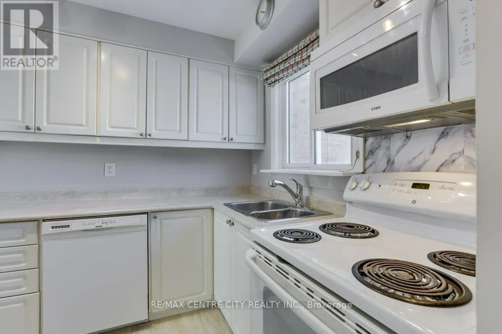 100 - 1328 COMMISSIONERS ROAD W, #100