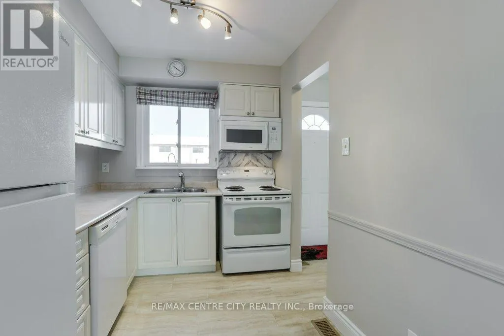 100 - 1328 COMMISSIONERS ROAD W, #100