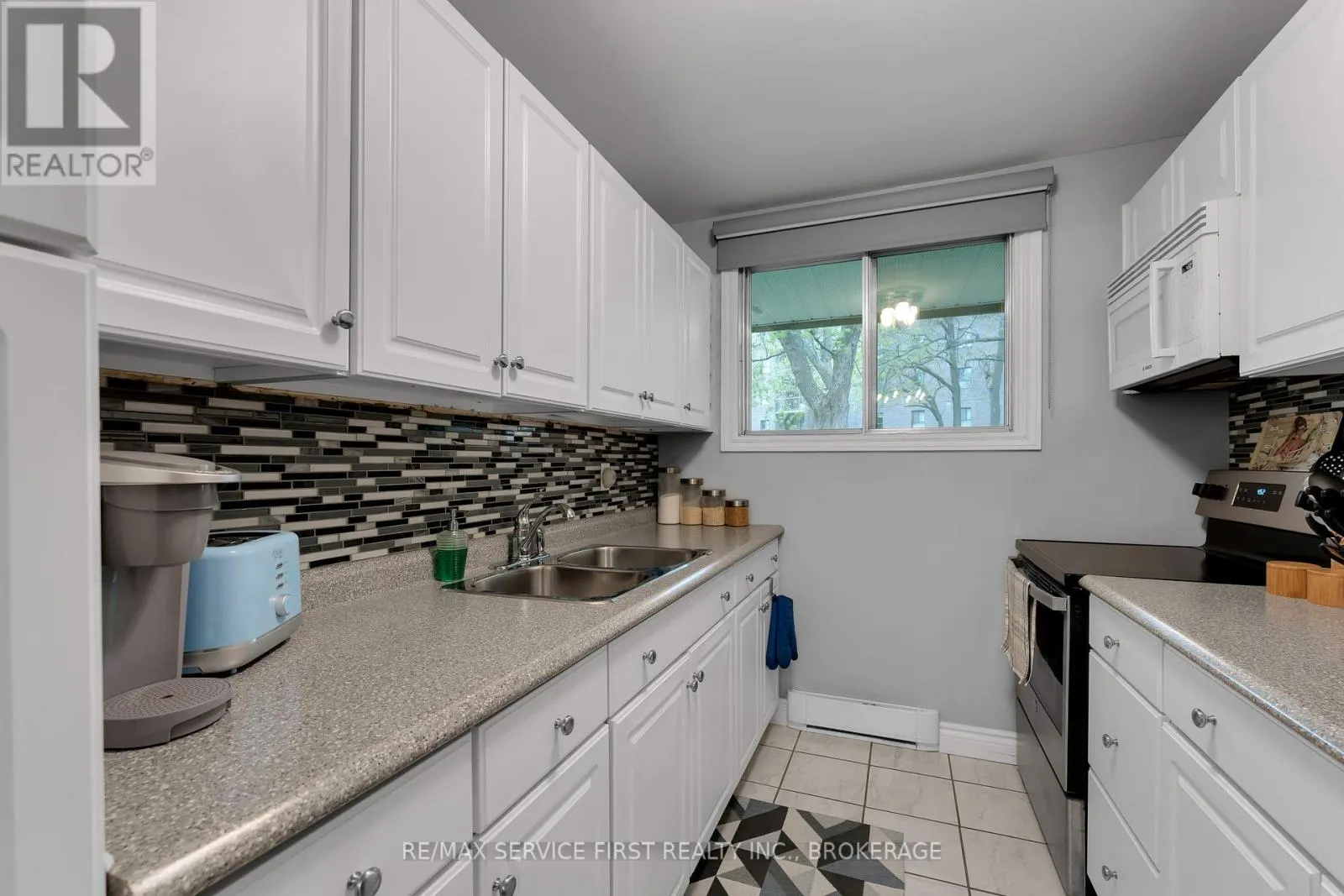 103 - 1010 PEMBRIDGE CRESCENT, #103
