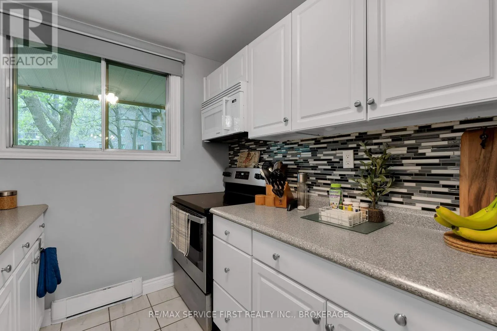 103 - 1010 PEMBRIDGE CRESCENT, #103