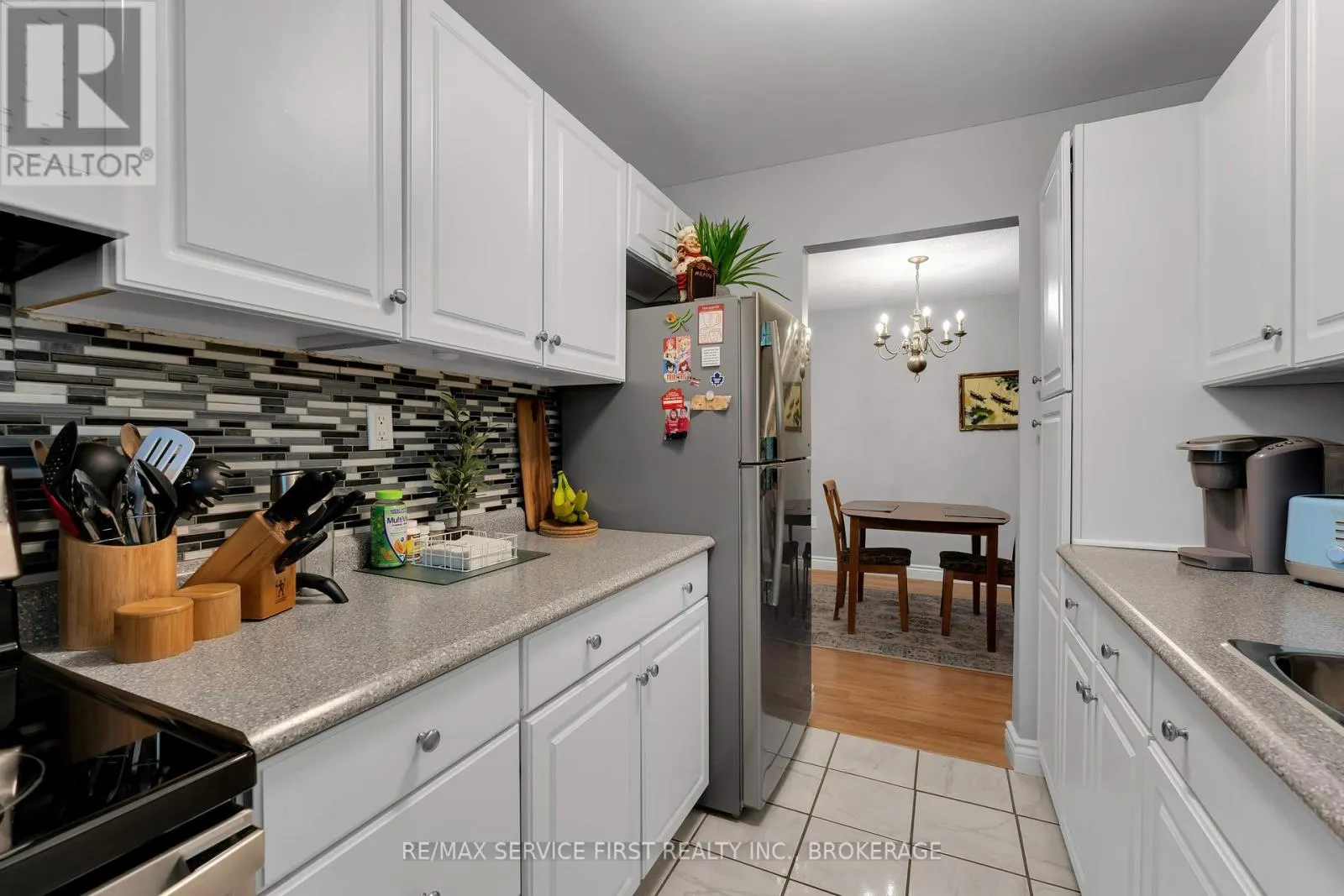 103 - 1010 PEMBRIDGE CRESCENT, #103
