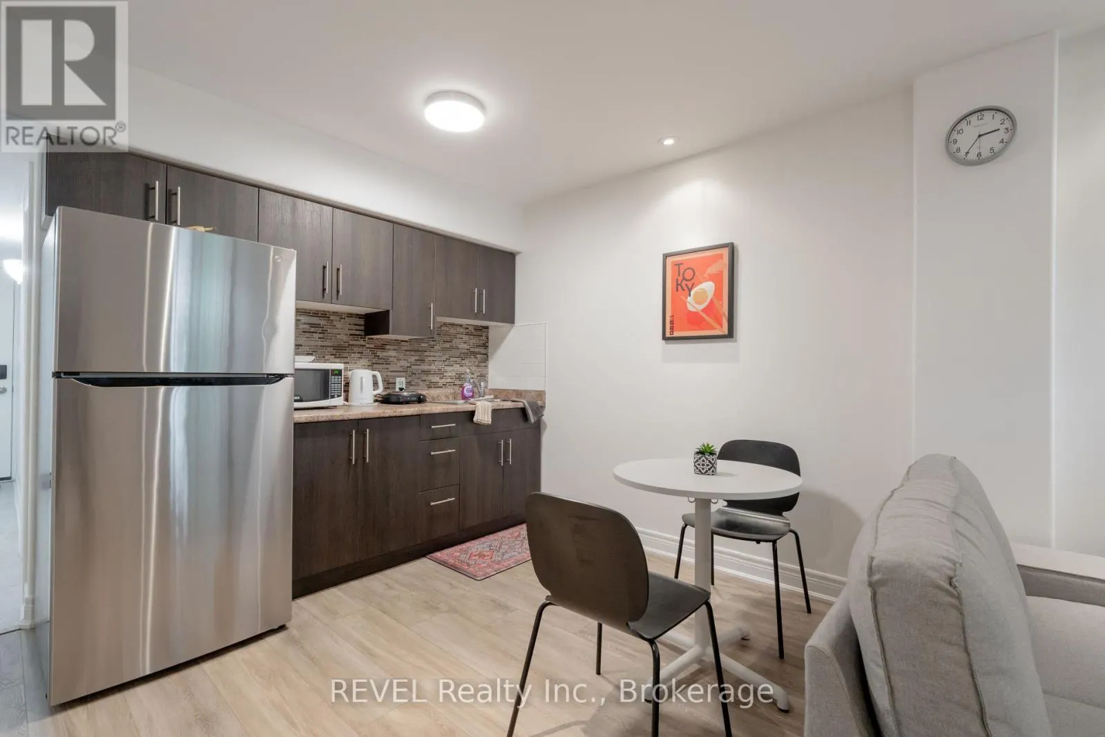 104 - 6045 DUNN STREET, #104