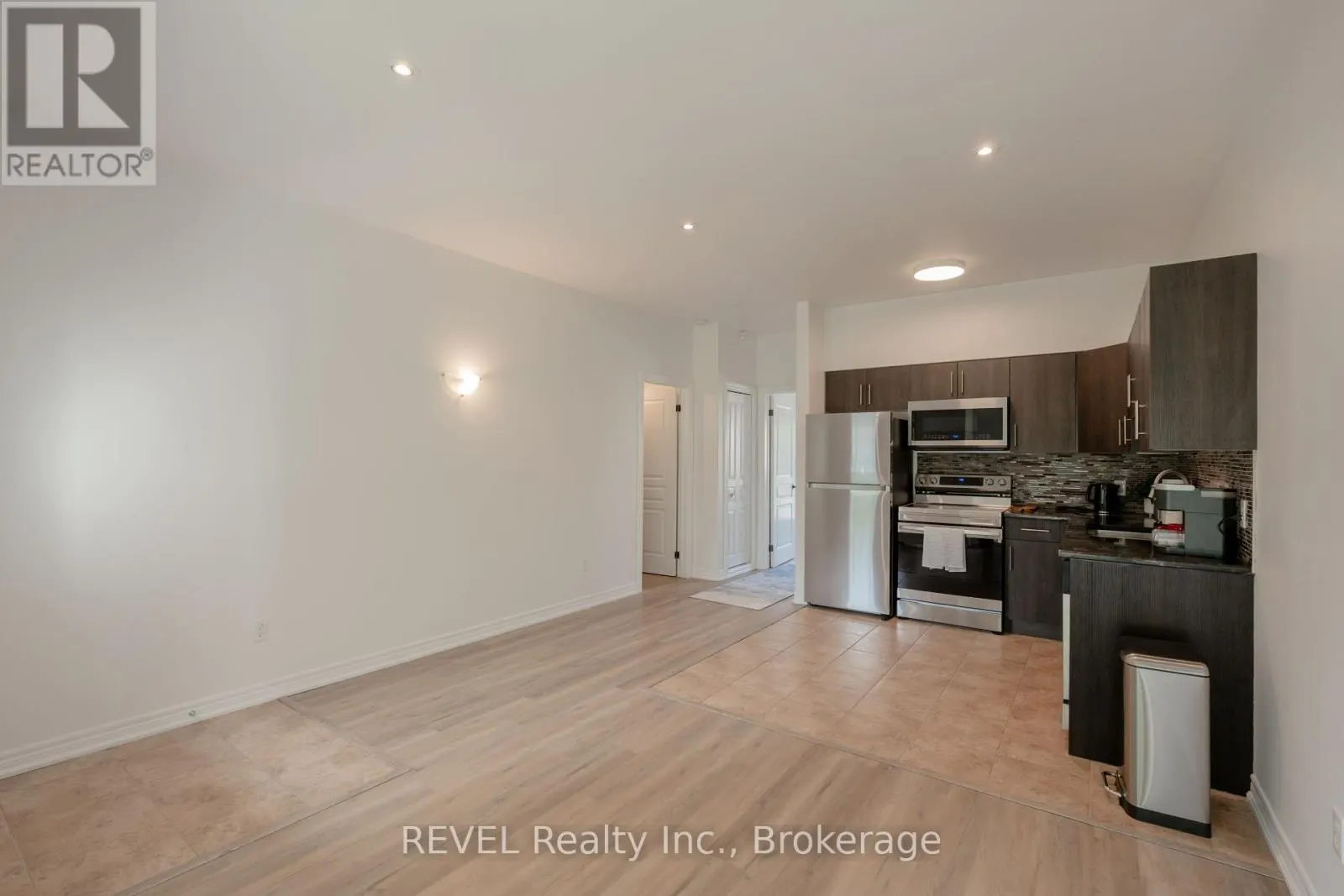 104 - 6045 DUNN STREET, #104