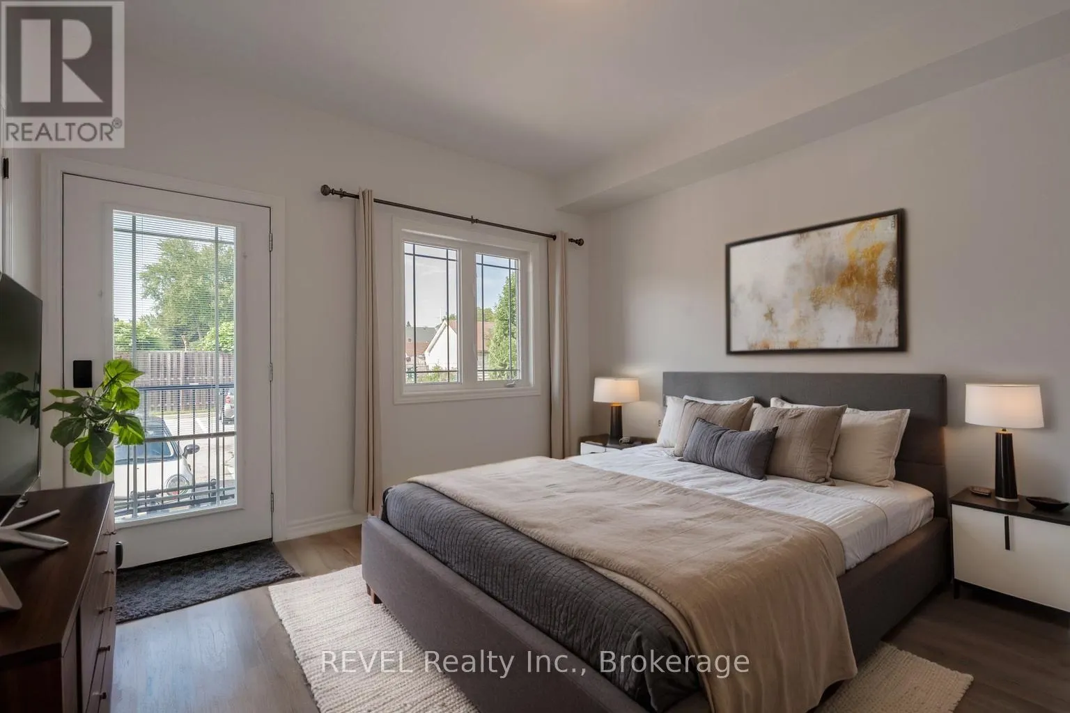 104 - 6045 DUNN STREET, #104