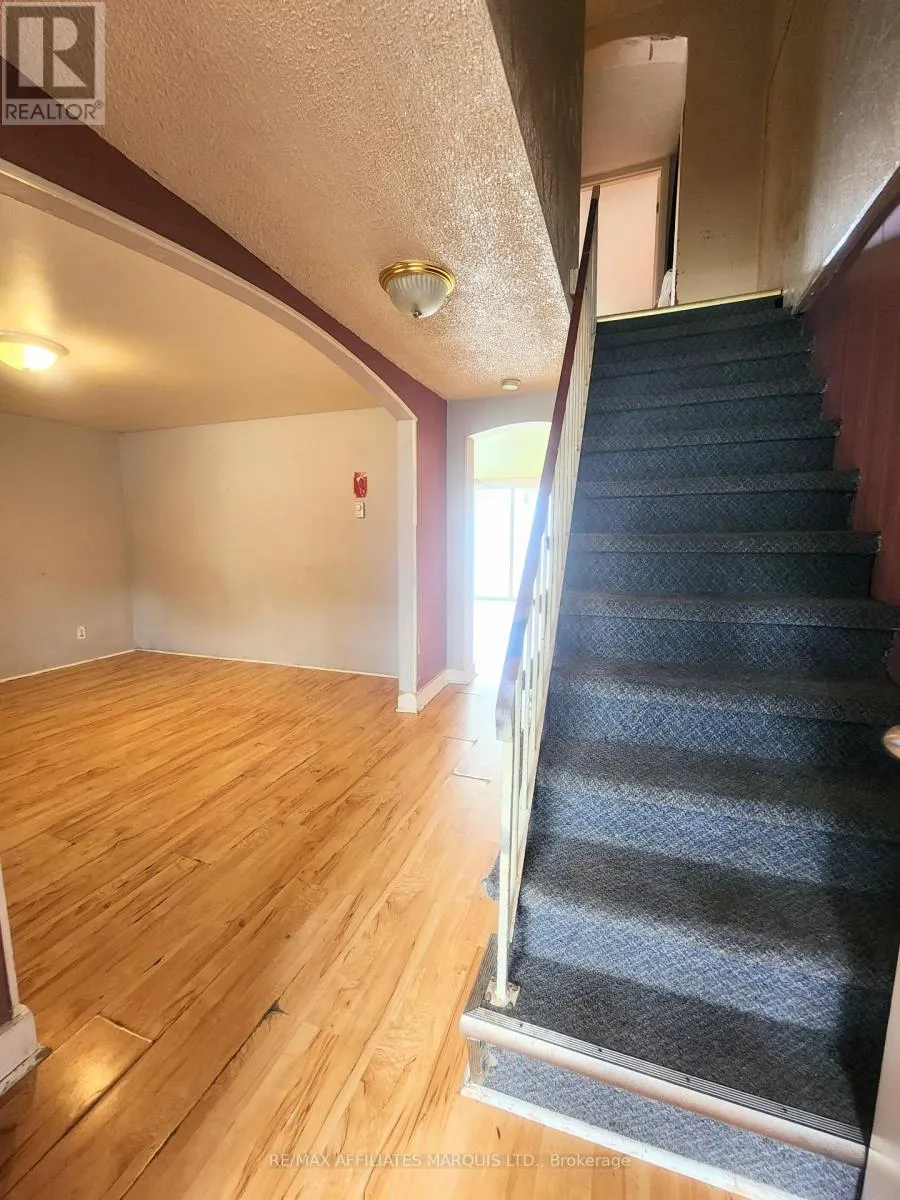 12-12A CARTIER AVENUE