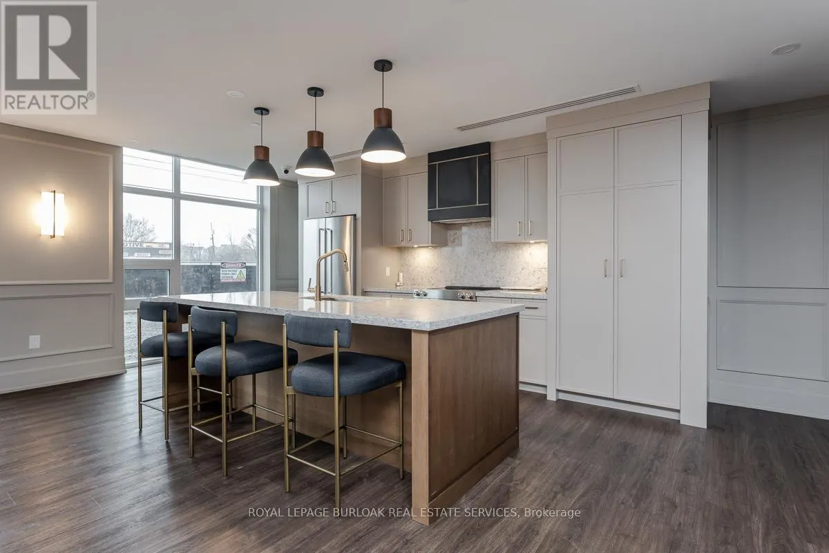 705 - 460 DUNDAS STREET E
