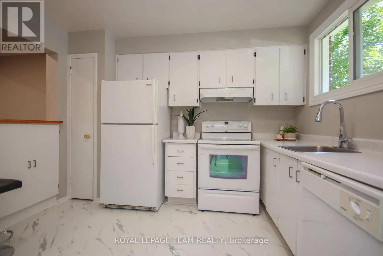 203 - 1427 PALMERSTON DRIVE