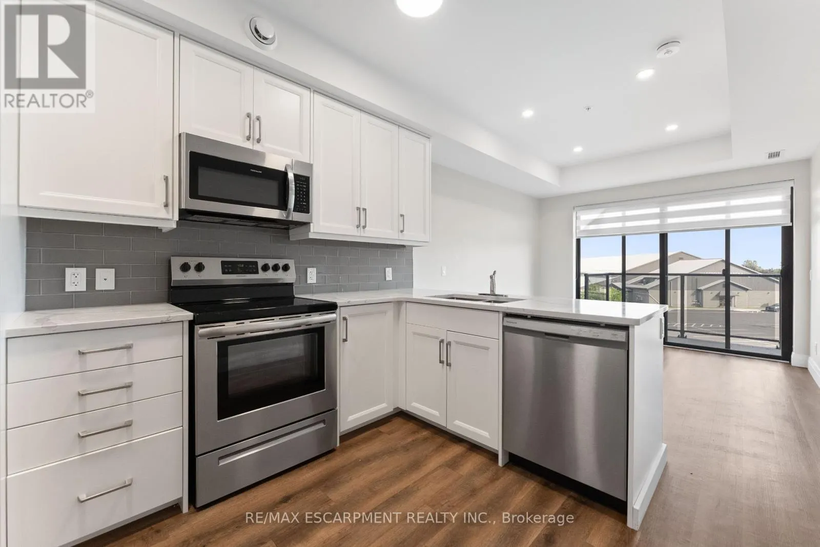303 - 64 MAIN STREET N