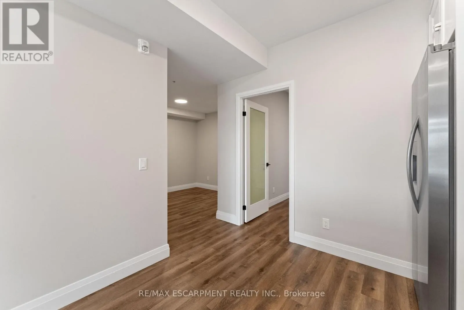 303 - 64 MAIN STREET N