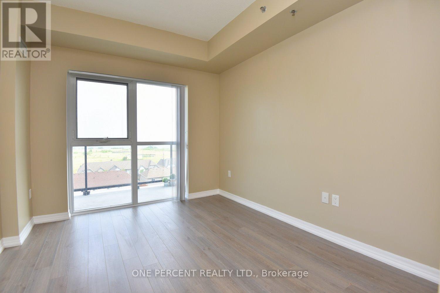 #605 -560 NORTH SERVICE RD, #605