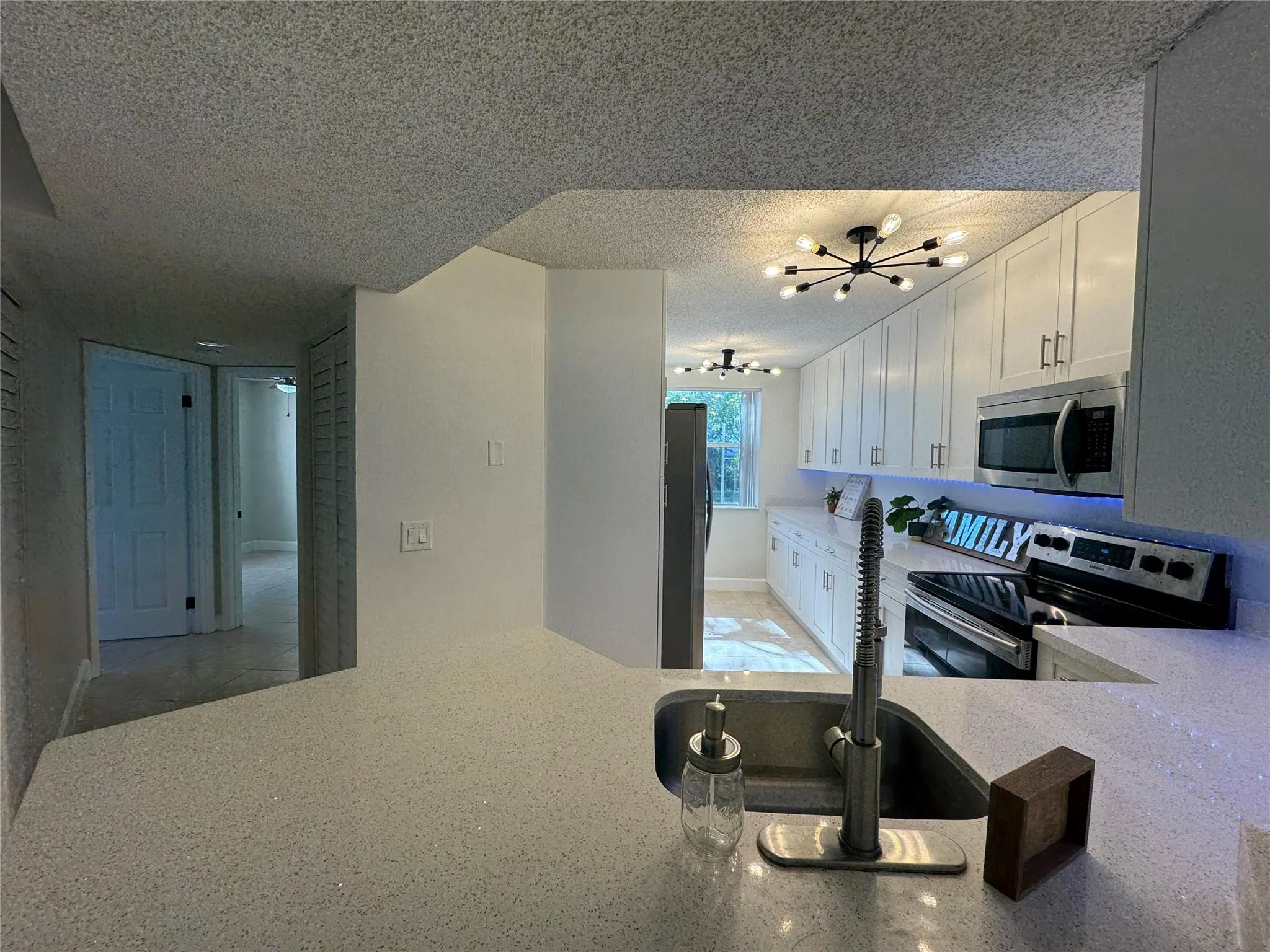 9033 Wiles Rd, #208