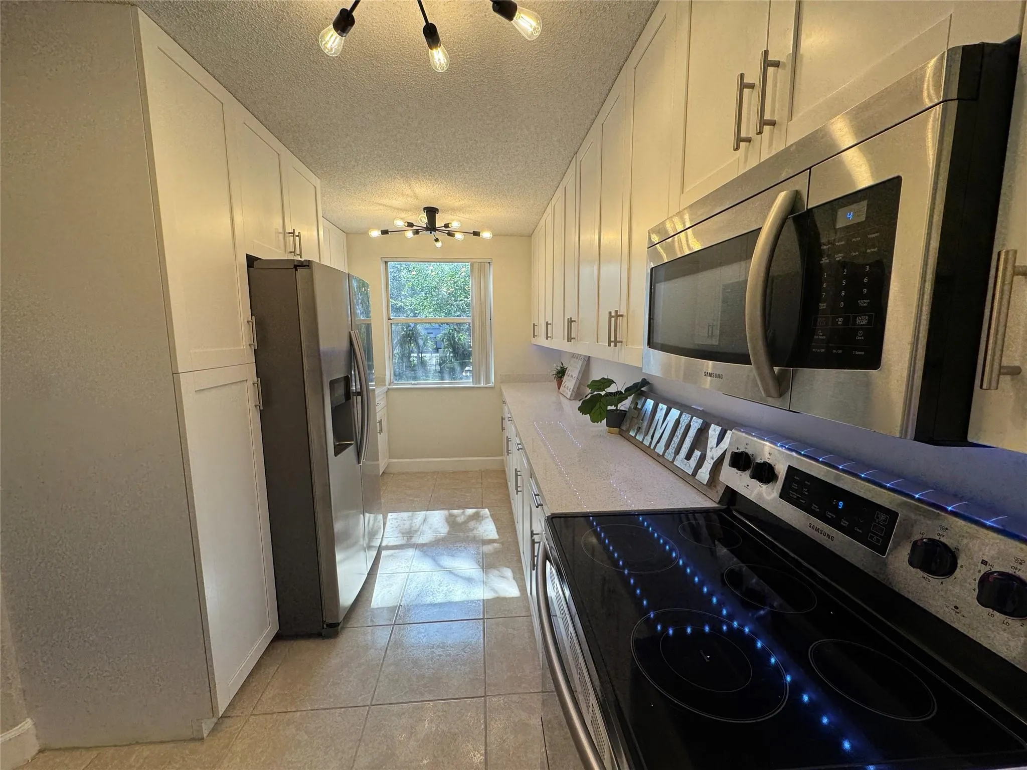 9033 Wiles Rd, #208