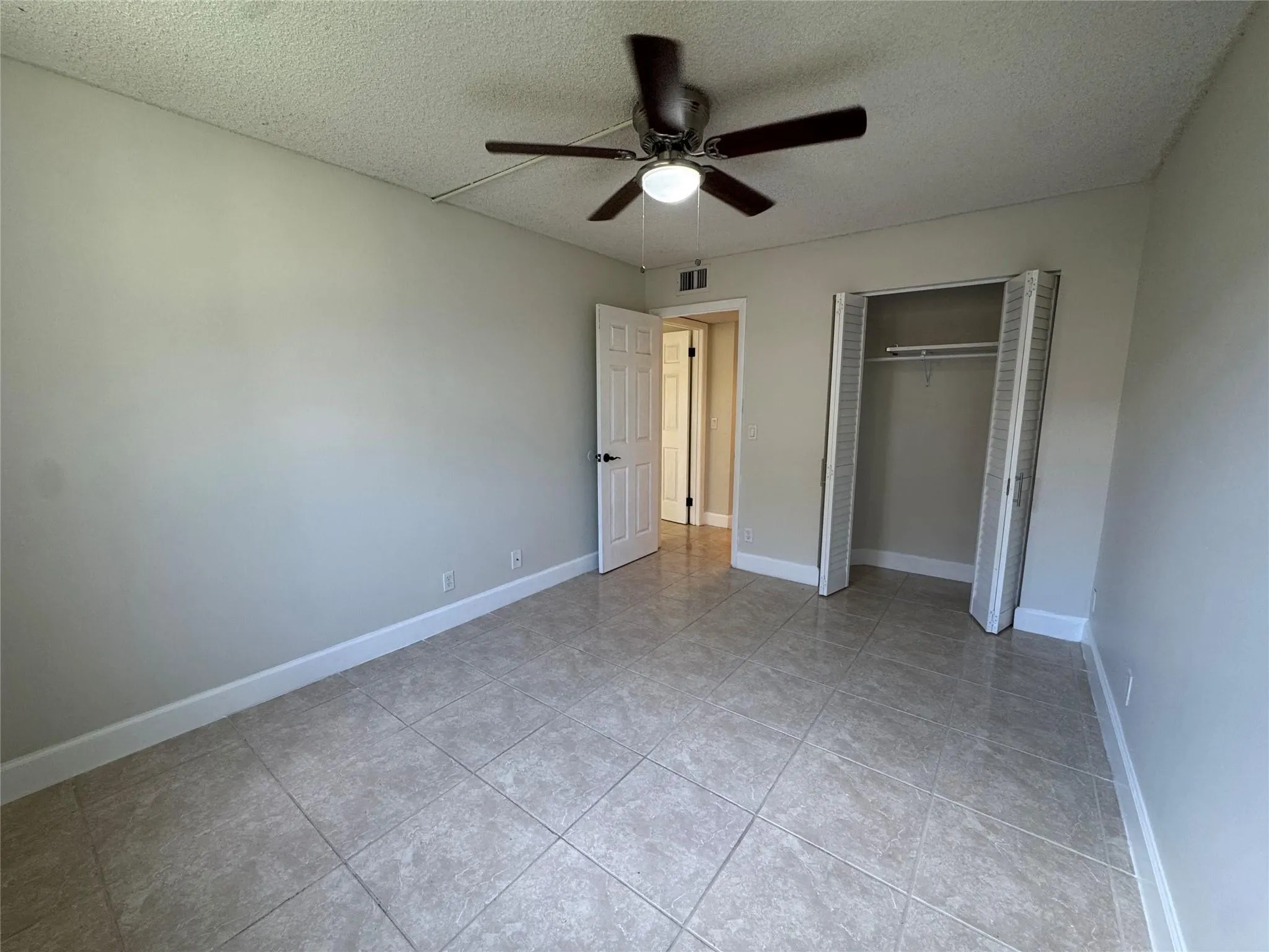 9033 Wiles Rd, #208