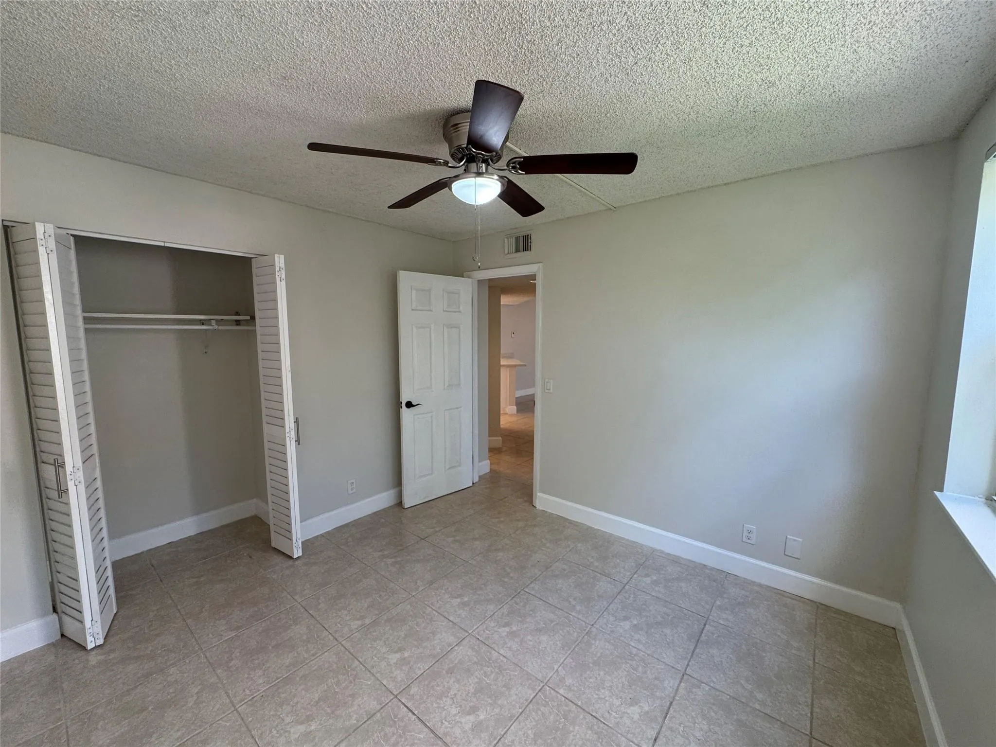 9033 Wiles Rd, #208