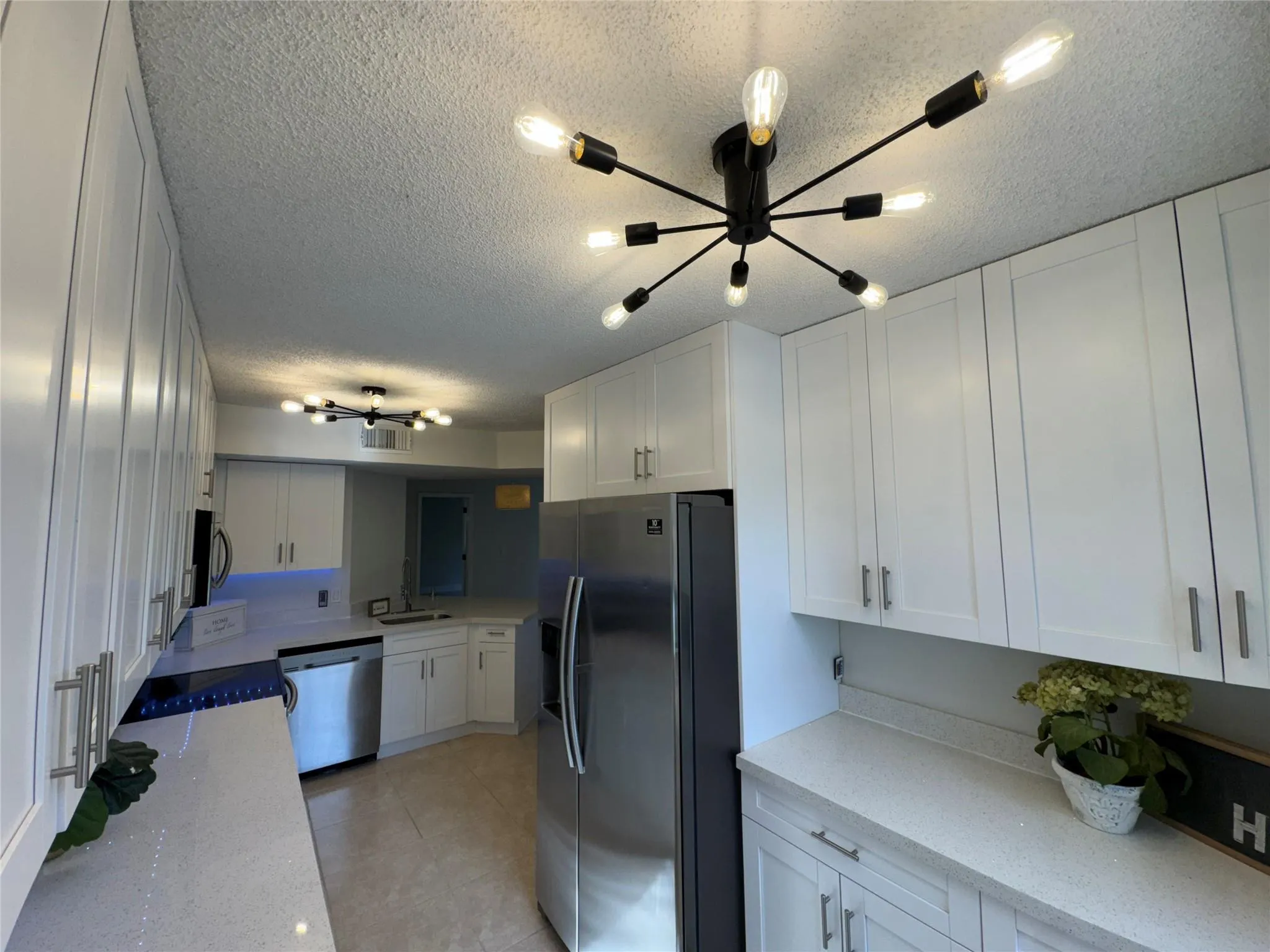9033 Wiles Rd, #208
