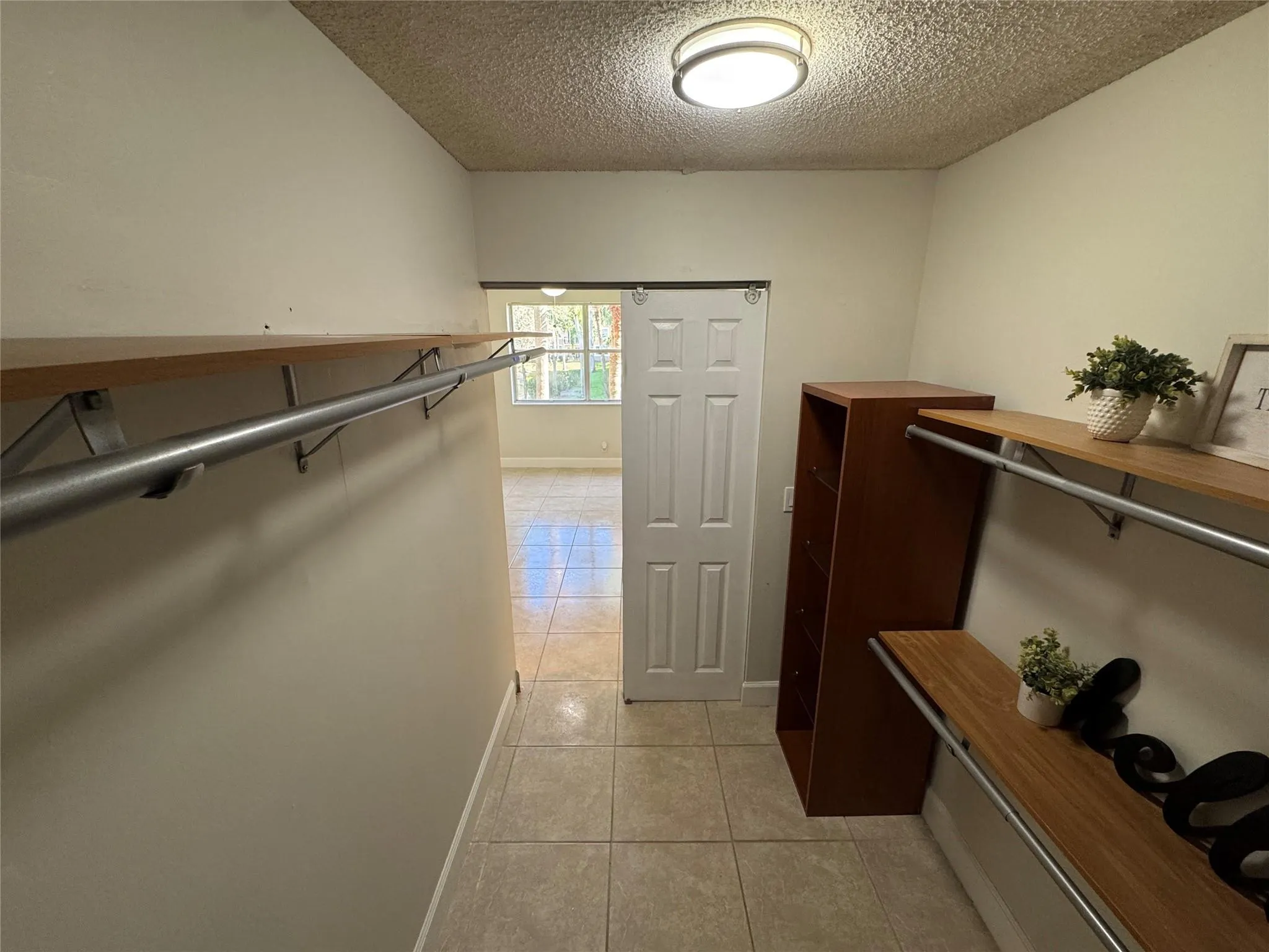 9033 Wiles Rd, #208