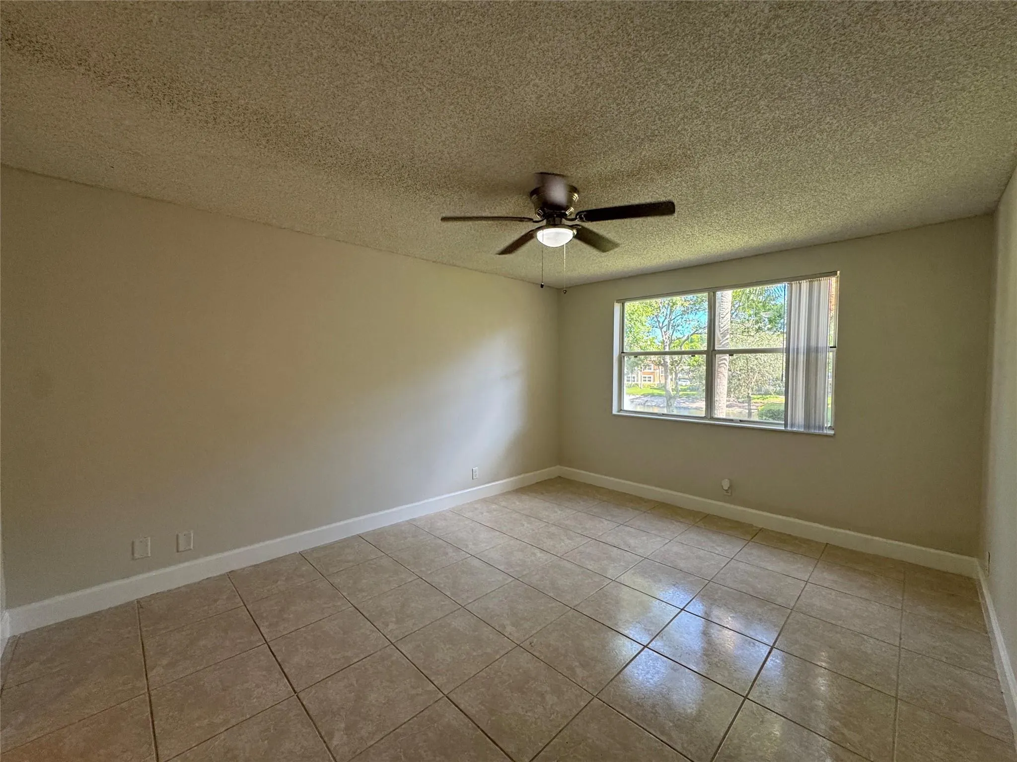 9033 Wiles Rd, #208