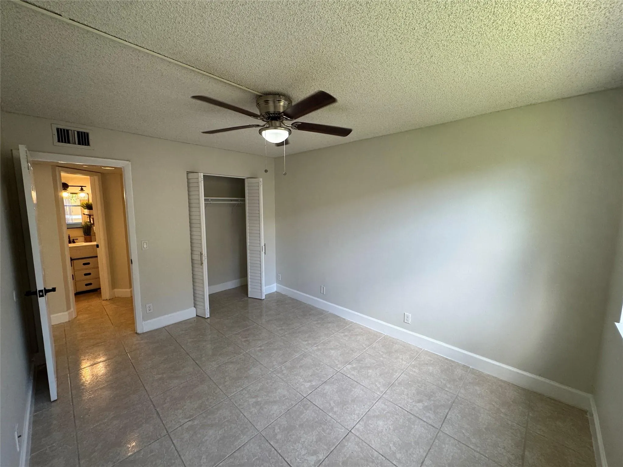 9033 Wiles Rd, #208