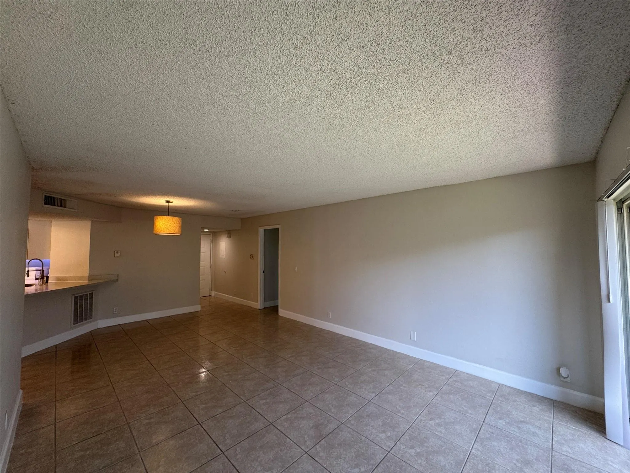 9033 Wiles Rd, #208
