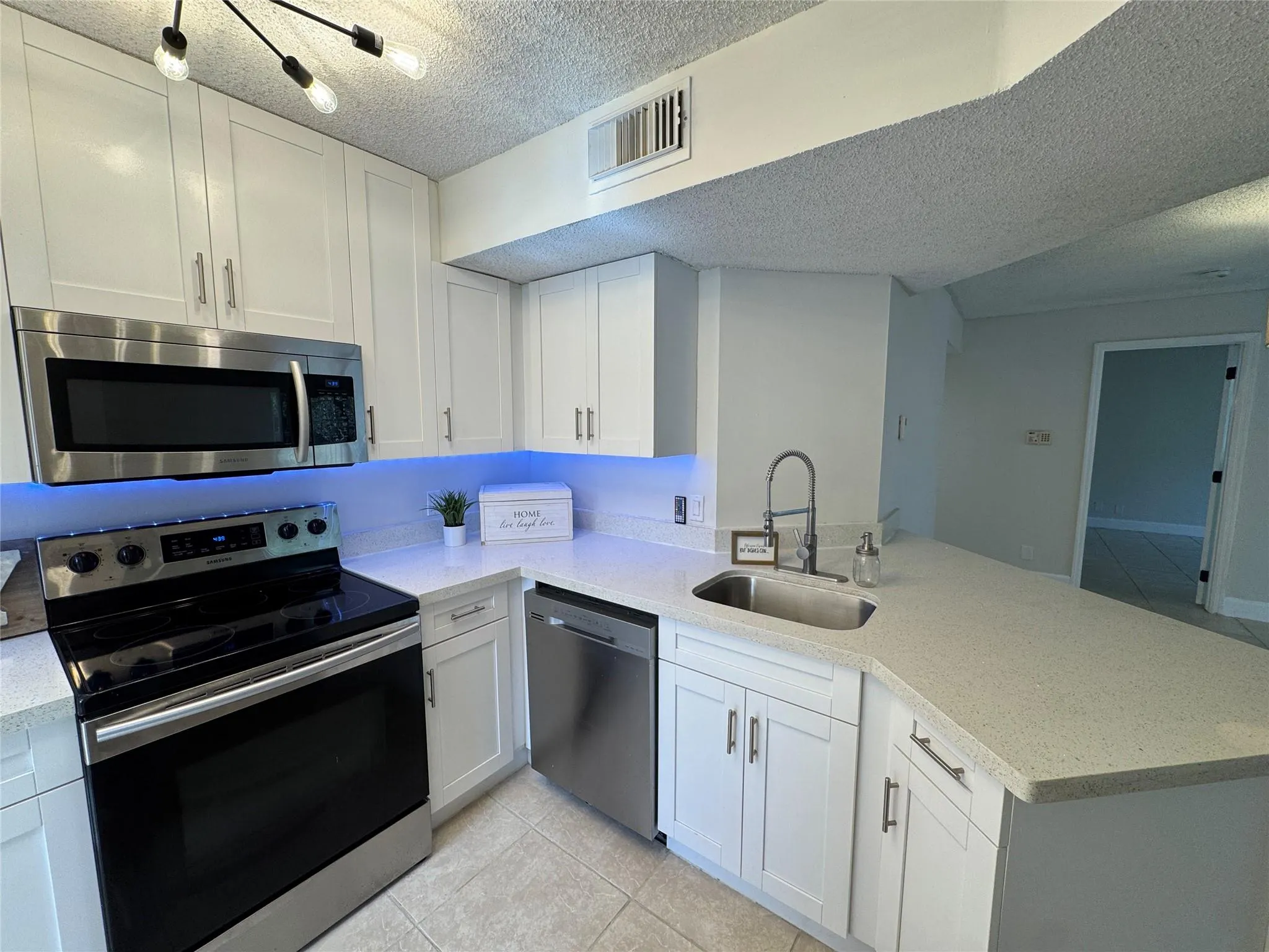 9033 Wiles Rd, #208