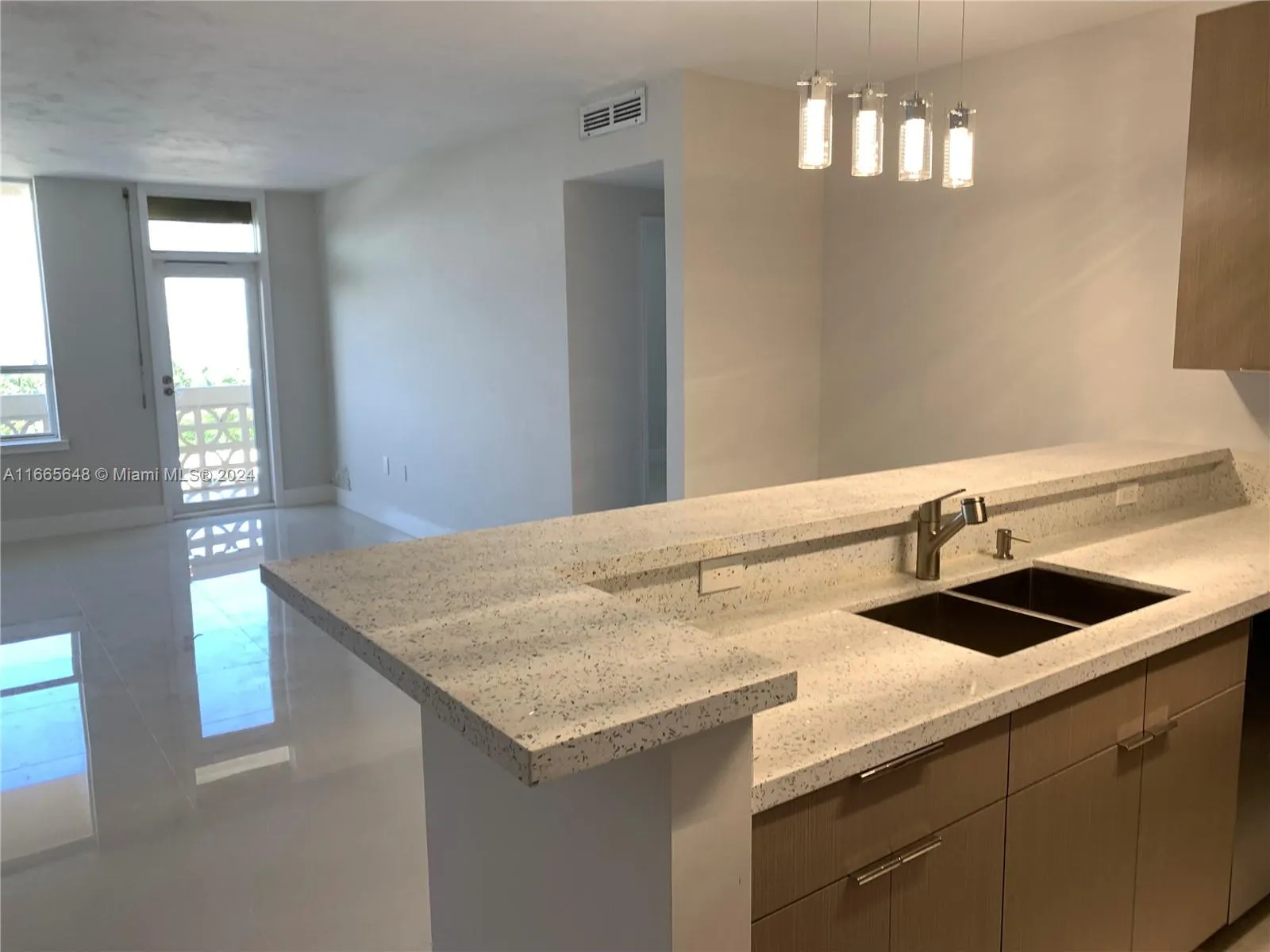 10185 Collins Ave, #406