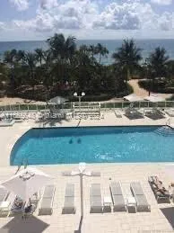 10185 Collins Ave, #406
