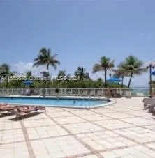 10185 Collins Ave, #406