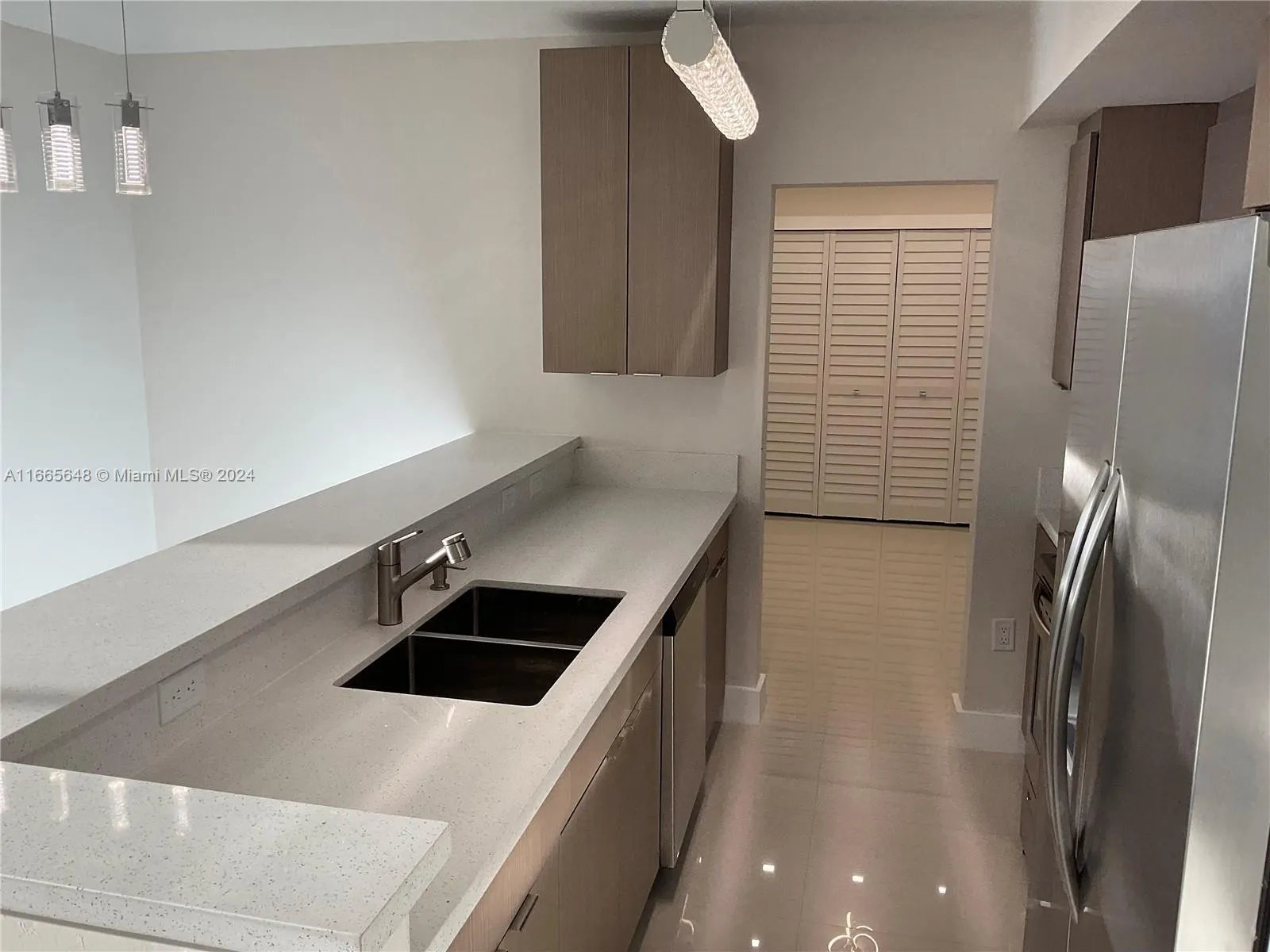 10185 Collins Ave, #406