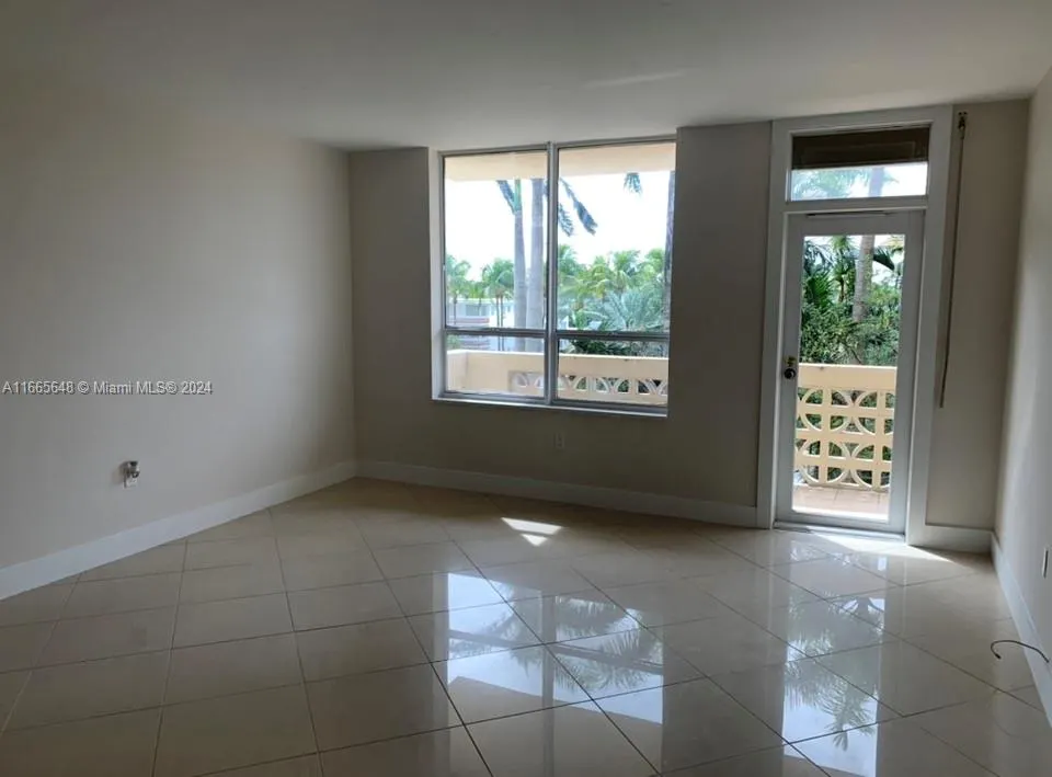 10185 Collins Ave, #406