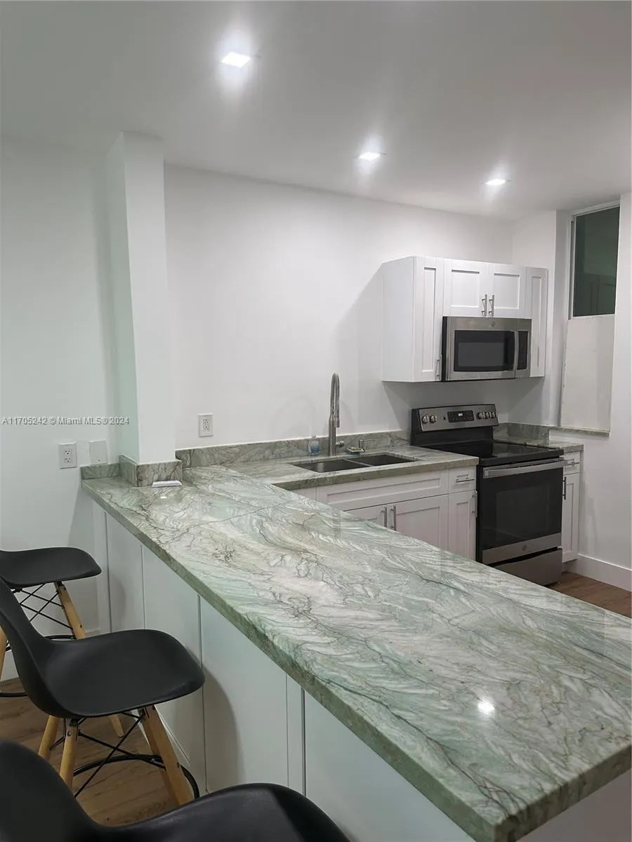 10210 Collins Ave, #306