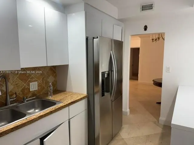 10185 Collins Ave, #308