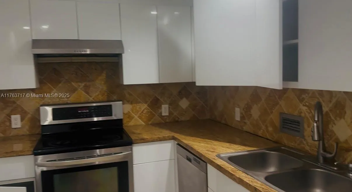 10185 Collins Ave, #308