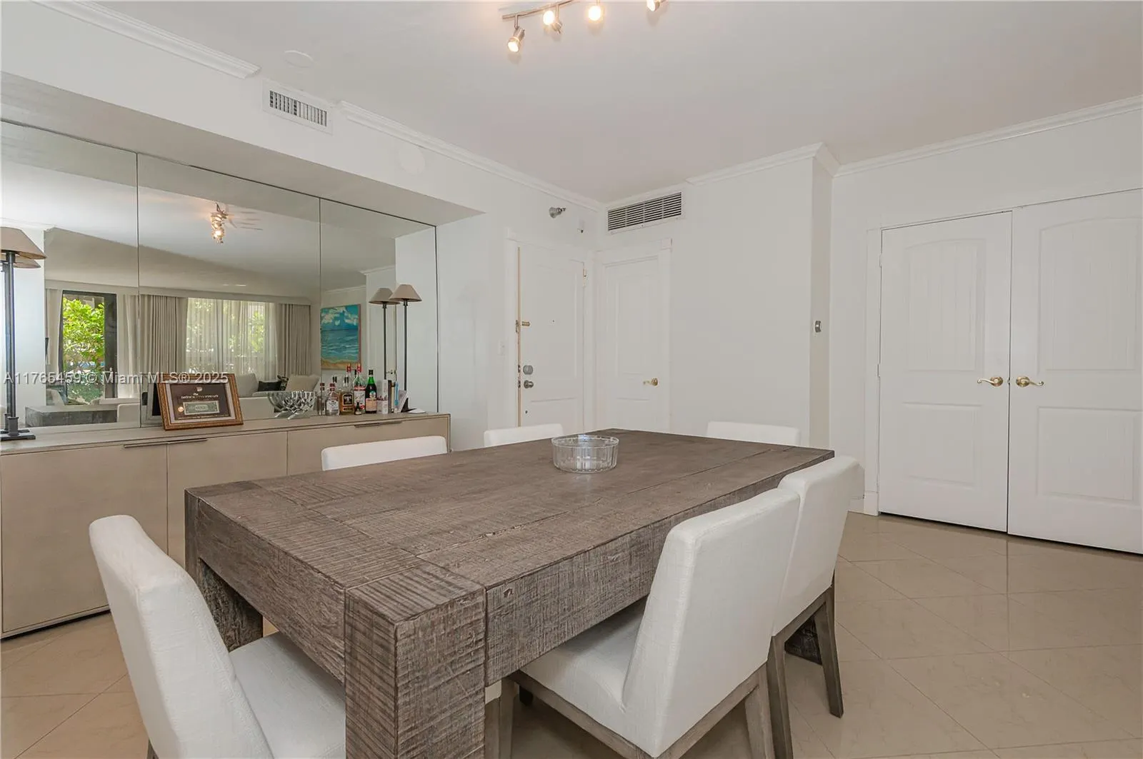 10185 Collins Ave, #212