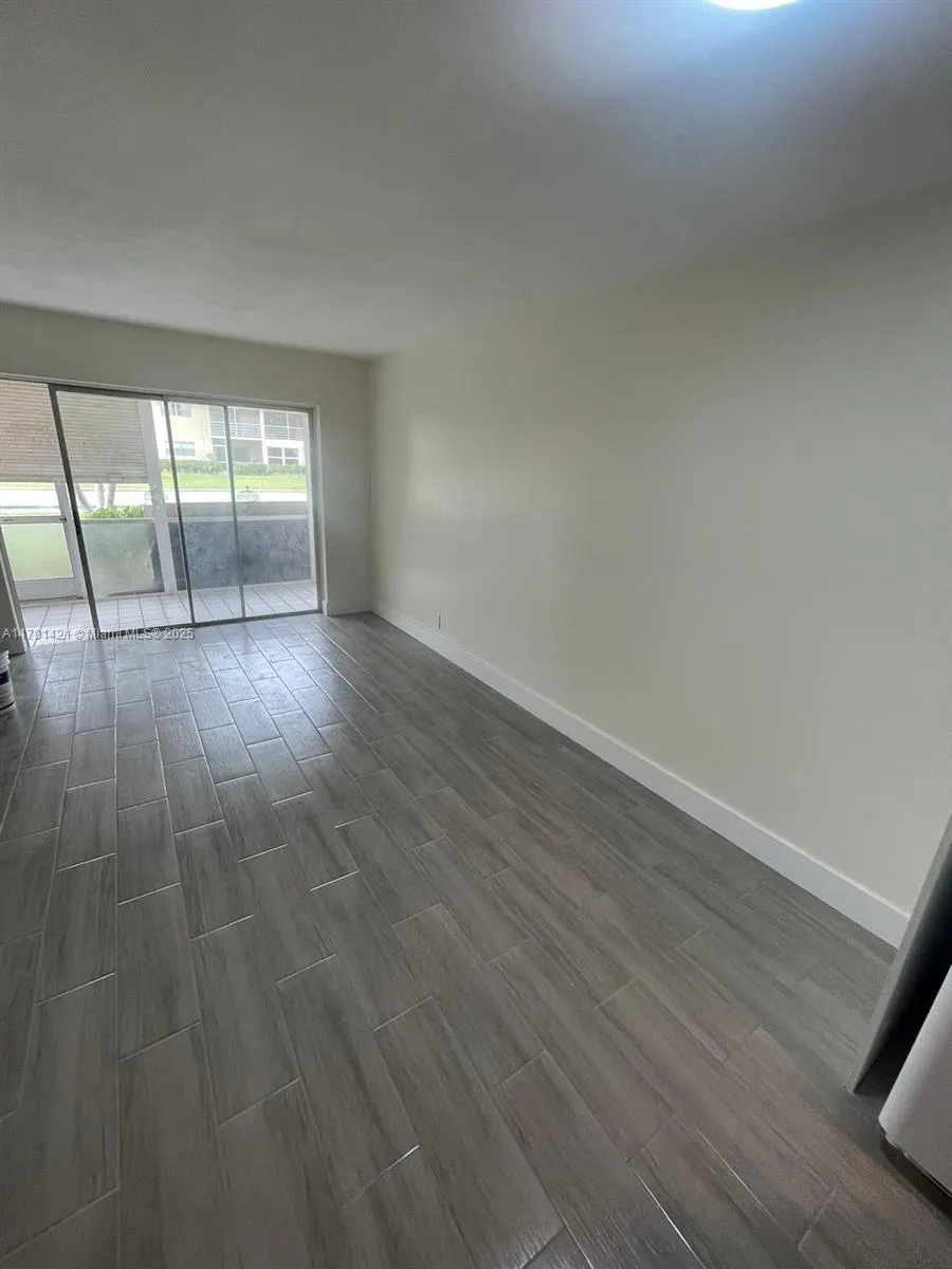 9851 Sandalfoot Blvd, #208