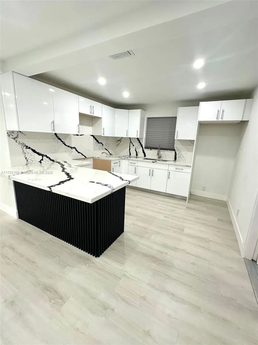 145 NW 2nd St